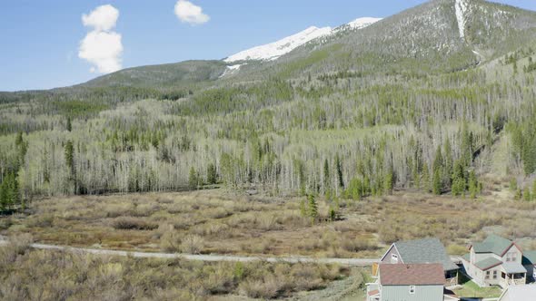 Aerial Establishing Shot of Mountain on the Edge of a Small Town (Frisco, Colorado)