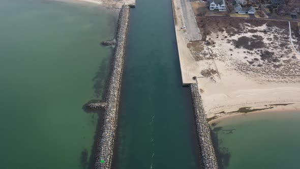 An aerial view over the Shinnecock Canal in Hampton Bays, Long Island, NY. The drone camera dolly ou