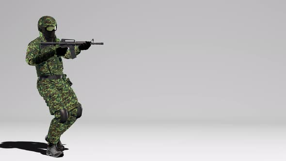 Soldier in camouflage walks with a weapon at the ready white background. alt
