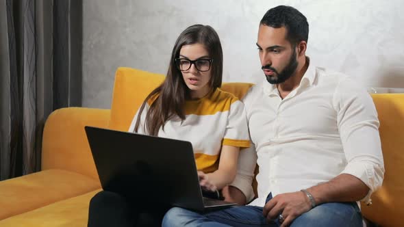 Family Couple Works on Project