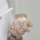 Dentist holding jaw model with implanted teeth. Explaining for student - VideoHive Item for Sale
