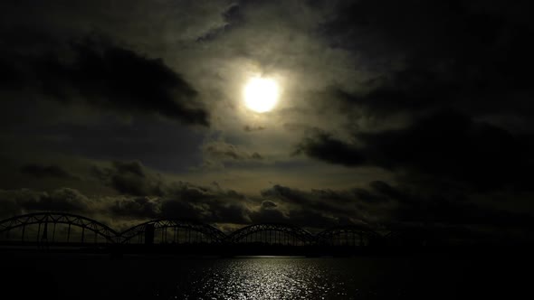 Night cityscape. Railroad bridge