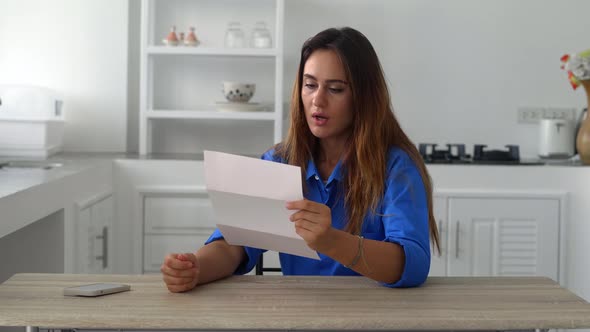 Frustrated Millennial Businesswoman Receiving Bad News of Bankruptcy Losing Business in Formal Paper