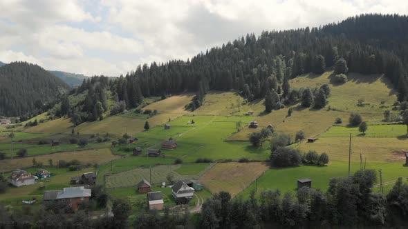 Scenic View of Rural Area in Mountains