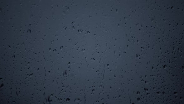 footage of window rain drops