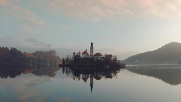 Close-up shot of a Beautiful golden morning at Lake Bled and the Julian Alps