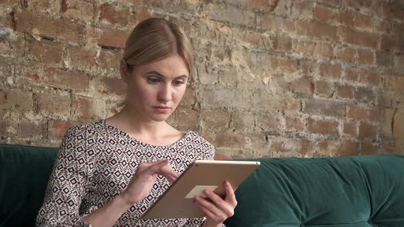 Woman uses tablet pc internet web surfing, girl, beautiful girl touches computer pad