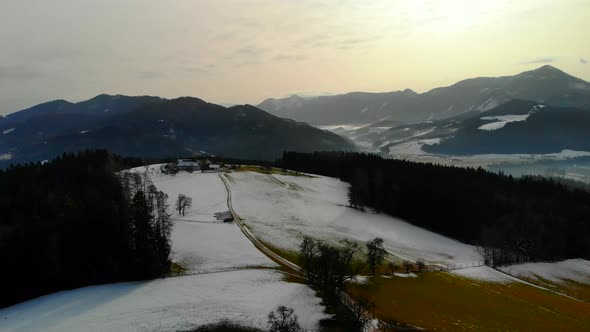 Drone Video with Mountein and Forest and Village in the Winter