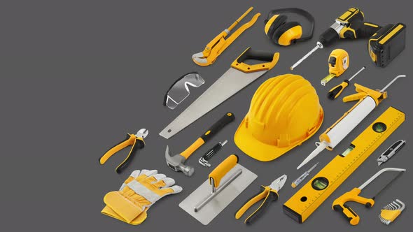 Construction work tools for building. Yellow hard hat with work equipment isolated grey background