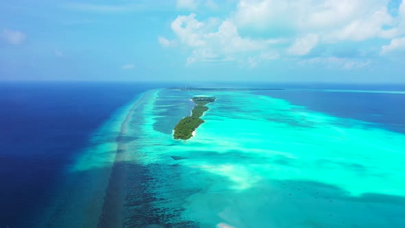 Luxury drone copy space shot of a white sand paradise beach and aqua blue ocean background 