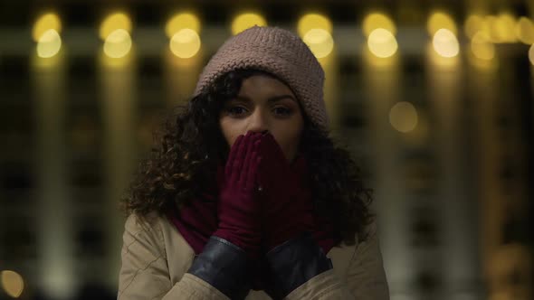 Happy Multiethnic Girl in Love Sending Air Kisses to Everyone, Posing for Camera