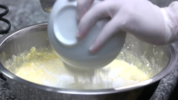 Adding Flour To Dough