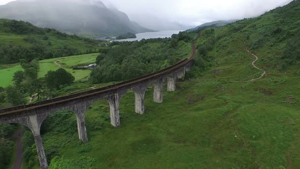 Aerial view of Glenfinnan Viaduct on a cloudy day