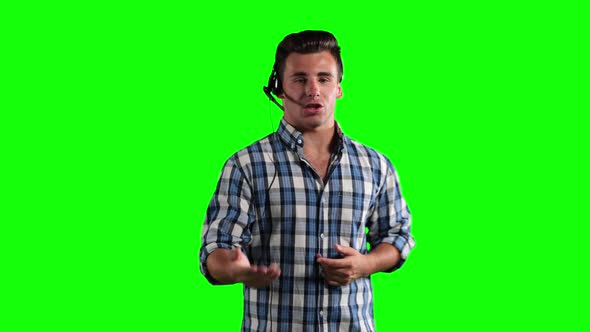 Animation of a Caucasian man using an earpiece and talking in a green background