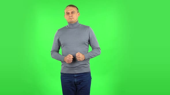 Male Is Refusing Stress and Taking Situation. Green Screen