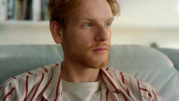 Pensive Man Looking Distance at Home Portrait