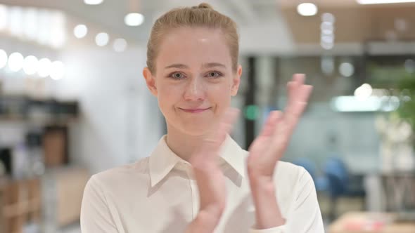 Portrait of Excited Young Businesswoman Clapping, Applauding