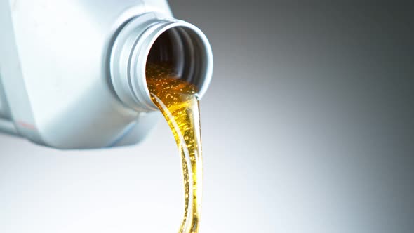 Super Slow Motion Shot of Pouring Oil From Plastic Container at 1000 Fps alt