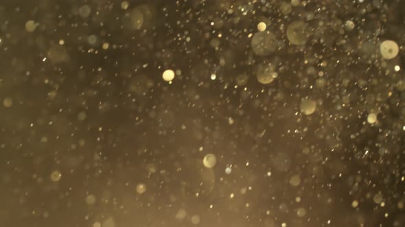 Golden Glitter Background in Super Slow Motion at 1000Fps