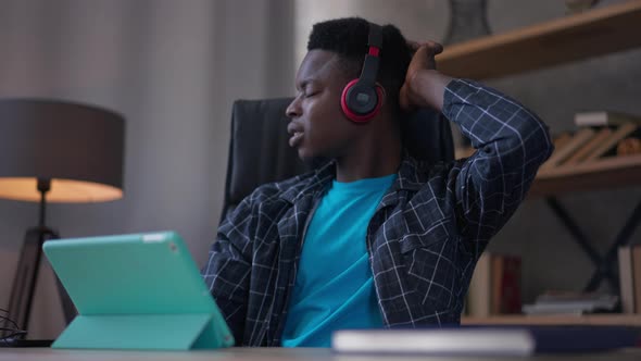 Young Thoughtful Man Scratching Head Thinking Startup Idea Strategy Sitting in Home Office with