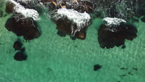 Aerial Panoramic View of Seascape with Crystal Clear Azure Sea and Rocky Shores