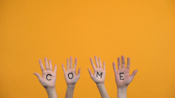 Come Written Palms on Orange Background, Activist Hands, Project Presentation