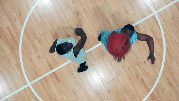 Slow Motion of African Basketball Players Training in the Gym