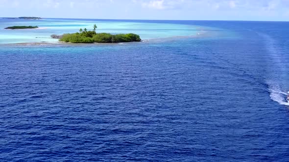 Daytime scenery of tourist beach voyage by blue sea and sand background before sunset