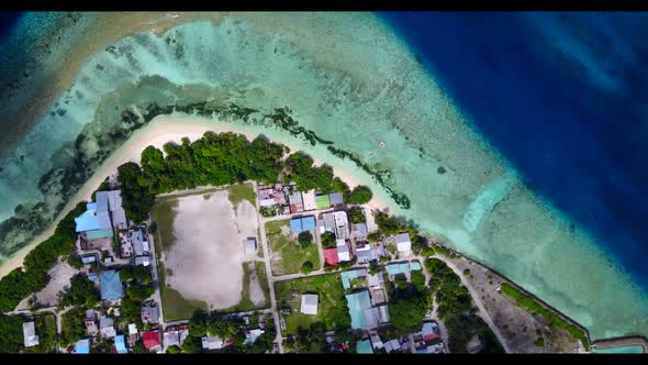 Aerial top down panorama of perfect island beach holiday by turquoise sea and clean sand background 