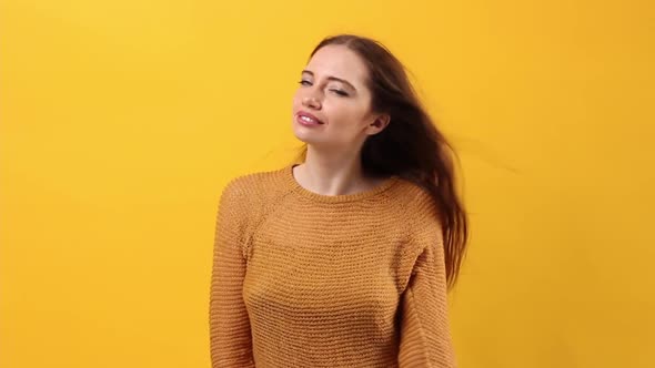 Young Beautiful Woman European Appearance Posing Studio Pastel Yellow Background