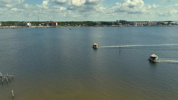 Aerial view of 2 floating Tiki Bars in Orange Beach, Alabama