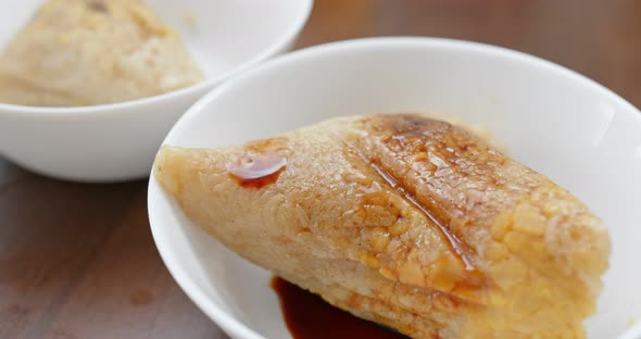 Eat with stick rice dumpling