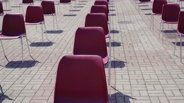 Rows of Empty Chairs Outdoors