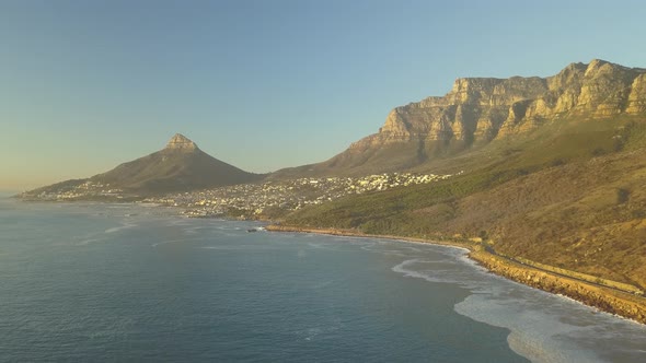 Scenic wide aerial Drone view of coastal Oudekraal Nature Reserve, Twelve apostles mountains, South