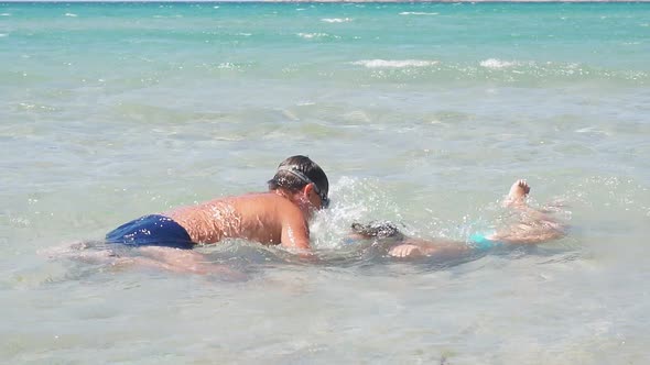 Happy, Funny Children, Boys Swimming in the Azure Sea Under Water, Having Fun on the Sea Beach. Slow