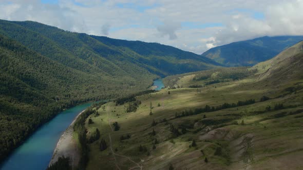 Blue Katun river in the middle of mountains of Ak-Kem valley in Altai