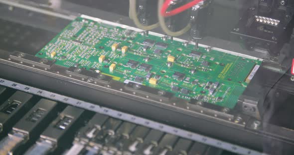 Surface Mount Technology SMT Machine places elements on circuit boards