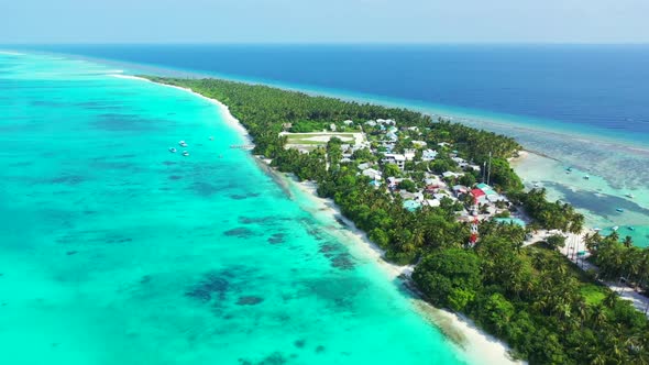 Aerial above sky of tranquil coast beach lifestyle by clear ocean and white sandy background of a da