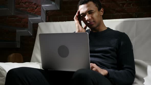 Tension Headache Frustrated African Man Working on Laptop