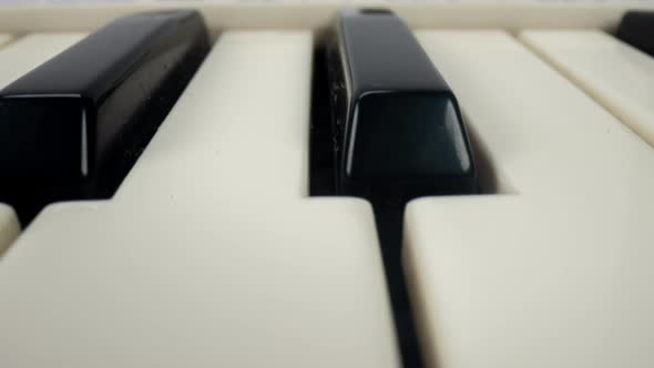 Panning Footage of Piano Keys