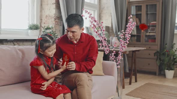 Portrait of Asian Father and Daughter