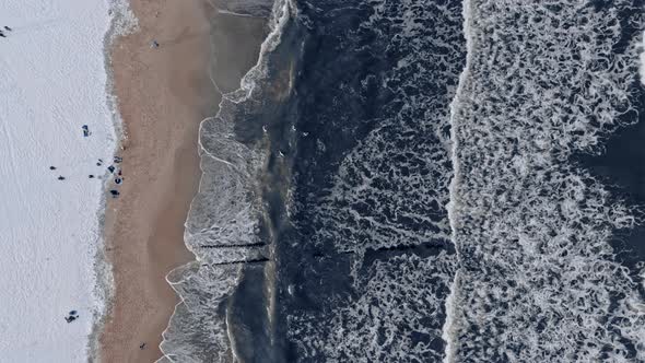 Winter swim in cold Baltic sea. Extreme sport in winter