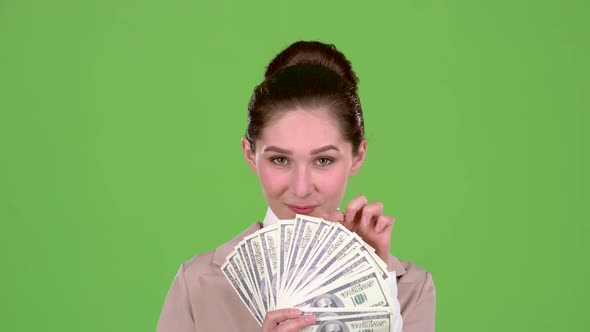 Girl Won the Jackpot in the Lottery. Green Screen