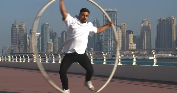 Stunning Wheel Gymnastics Tricks By a Young Man on The Palm Jumeirah