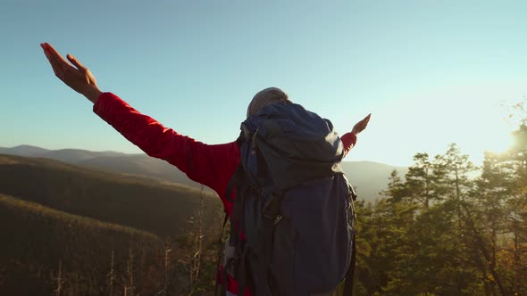 Slow Motion Portrait Happy Carefree Girl Hiker with Backpack Relaxing and Enjoying Sunset View