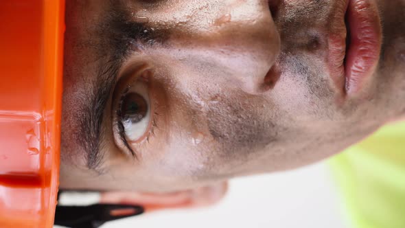 Portrait Tired Wet with Sweat Mixed Race Guy with Dirty Face in Work Hard Hat