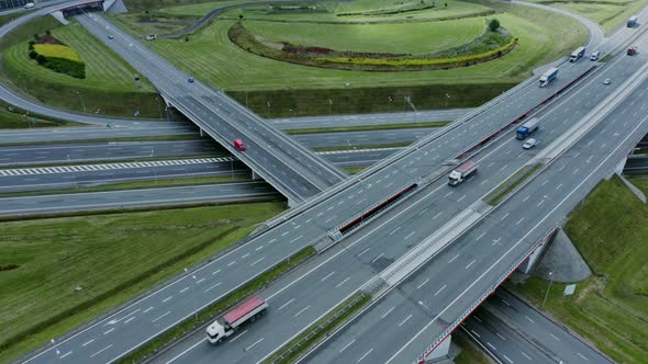 Video Filming From a Drone View of the Road Junction with Cars Moving Along It