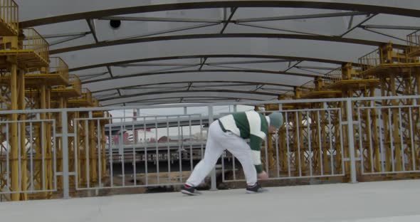 Parkourist Freerunning at Construction Site