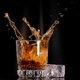 Ice Falling Into Whiskey Glass In Slow Motion - VideoHive Item for Sale