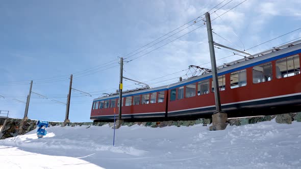 Train Passing By the Matterhorn Mountain in Zermatt